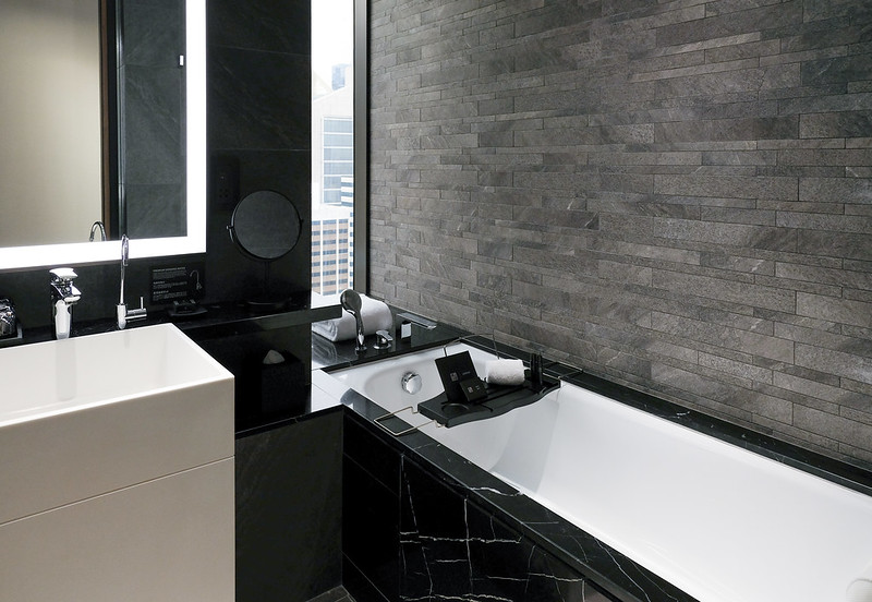 grand premier room bathroom - the clan hotel